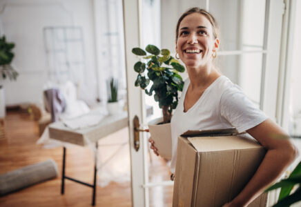 Woman arriving in new apartment