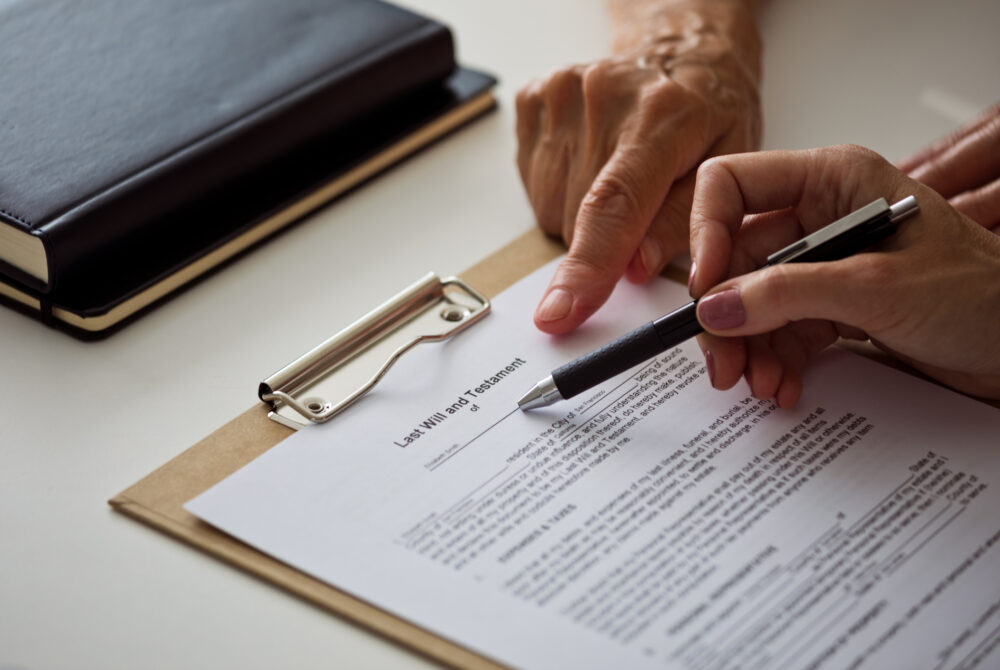 Senior woman discussing the will with lawyer