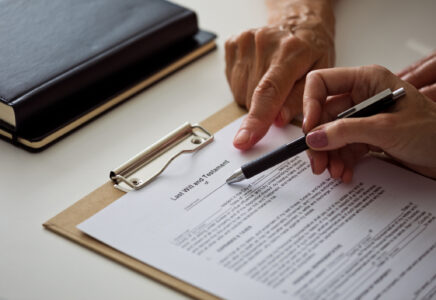 Senior woman discussing the will with lawyer
