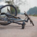 Accident car crash with bicycle on road because drunk driving.